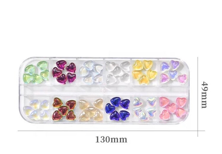 Hearts shapes acrylic aurora pastel colors nail 3D art.